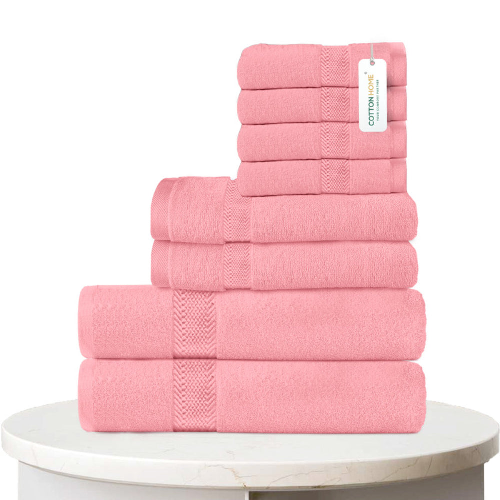 طقم مناشف قطنية فاخرة من كوتون هوم، مكون من 8 قطع: 4 مناشف للوجه (30×30 سم)، منشفتان لليدين (40×70 سم)، منشفتان للاستحمام (70×140 سم)، وزن 600 غرام/متر مربع، سريع الجفاف ومتين.