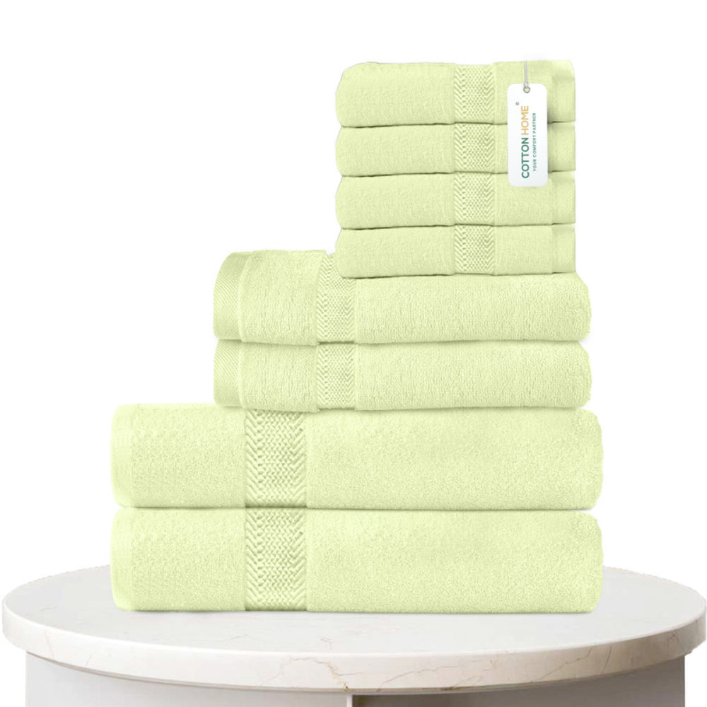 طقم مناشف قطنية فاخرة من كوتون هوم، مكون من 8 قطع: 4 مناشف للوجه (30×30 سم)، منشفتان لليدين (40×70 سم)، منشفتان للاستحمام (70×140 سم)، وزن 600 غرام/متر مربع، سريع الجفاف ومتين.