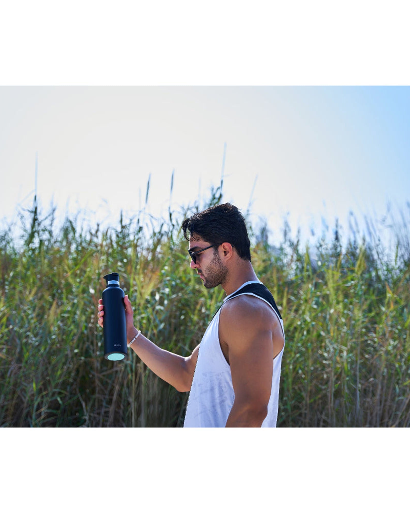 زجاجة مياه مويا "كورال ريف" المعزولة والمستدامة، سعة لتر واحد، باللون الأسود