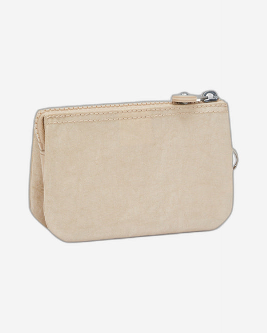 محفظة Kipling Creativity S صغيرة بلون بيج لامع 15205-5DV