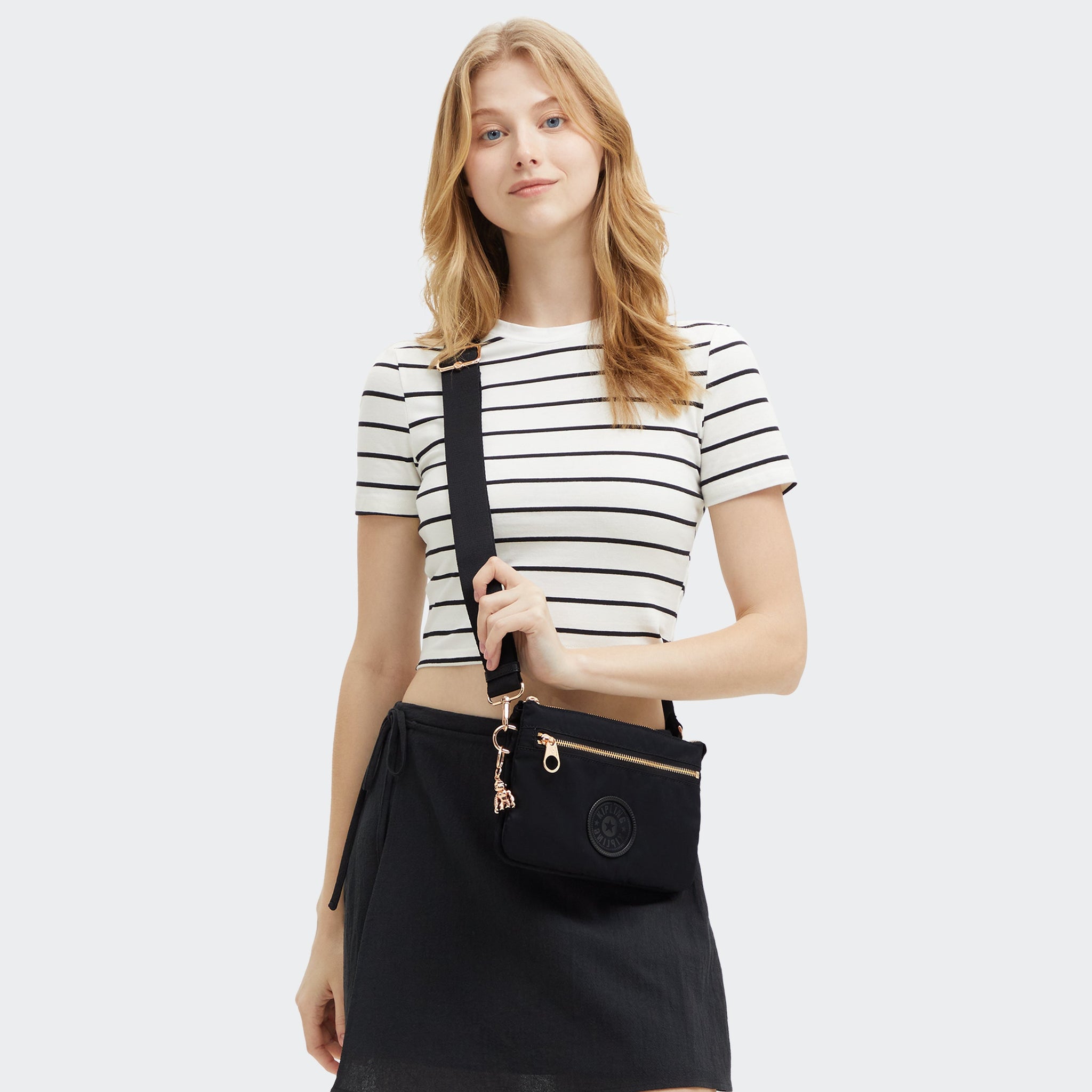 حقيبة كيبلينج ريرى زيب صغيرة سوداء وردية اللون I3302-62Q