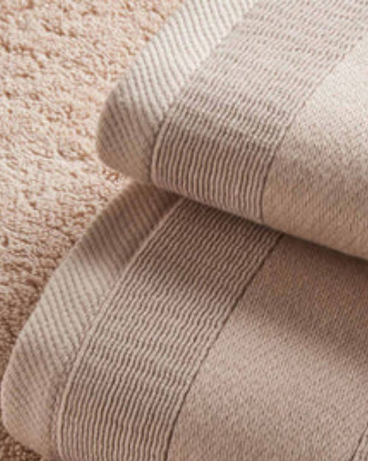 مجموعة مناشف الحمام "سيجنيتشر" من كريستي باللون الوردي الصدفي