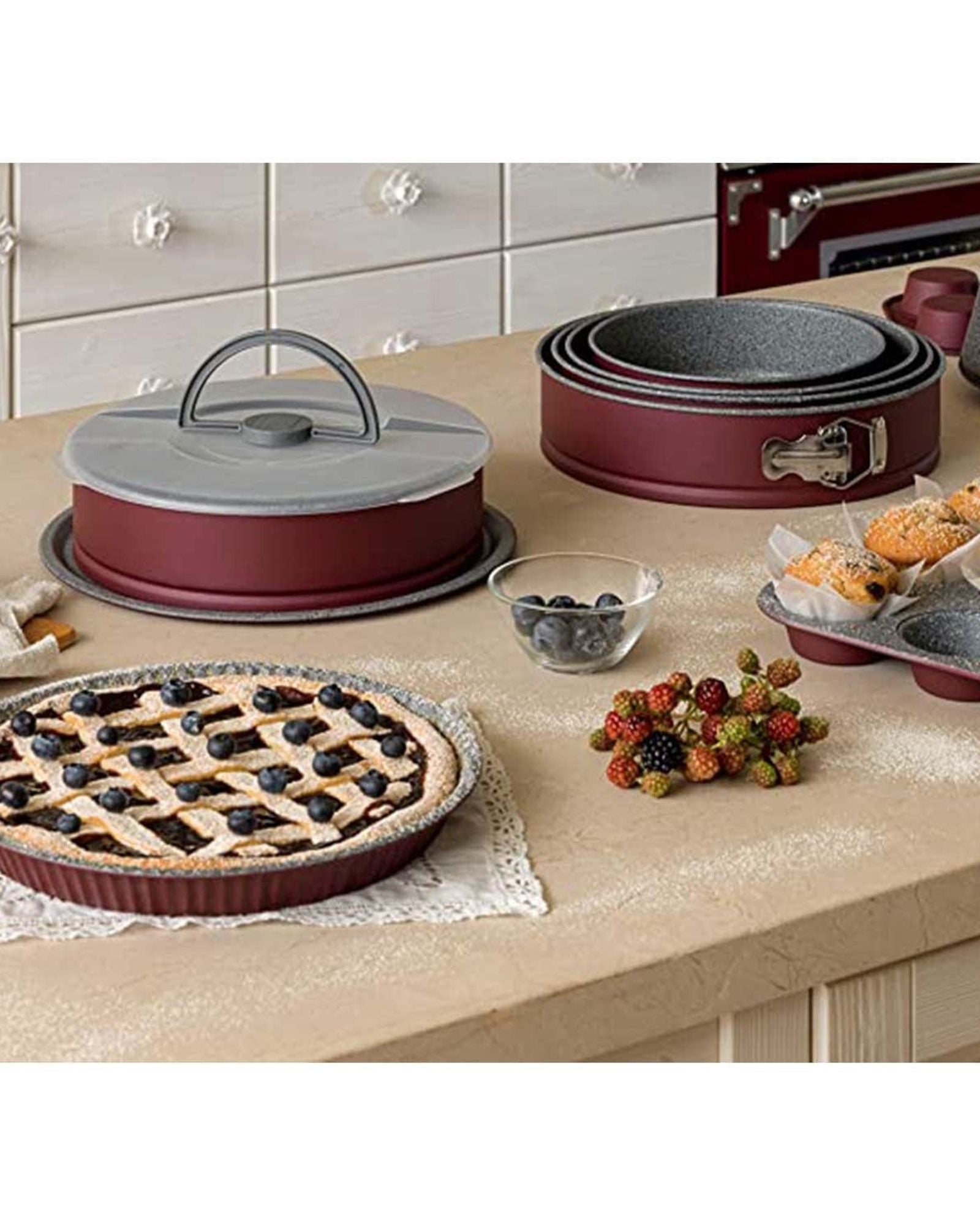 قالب توغنانا بورسلين (قالب كيك زنبركي، دائري، سطح مستوٍ، رمادي، أحمر، فولاذ كربوني، إيطاليا)