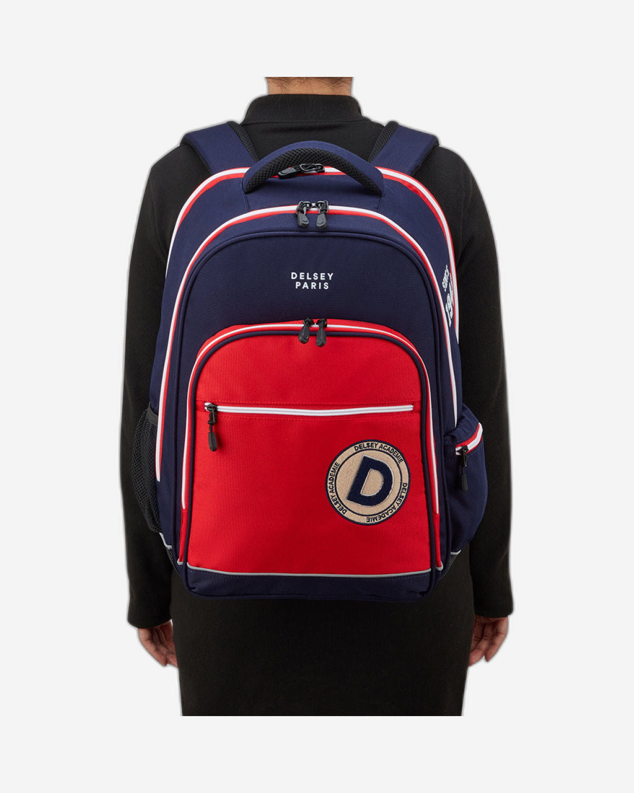 حقيبة ظهر مطبوعة من ديلسي باريس لفرقة BTS 2025