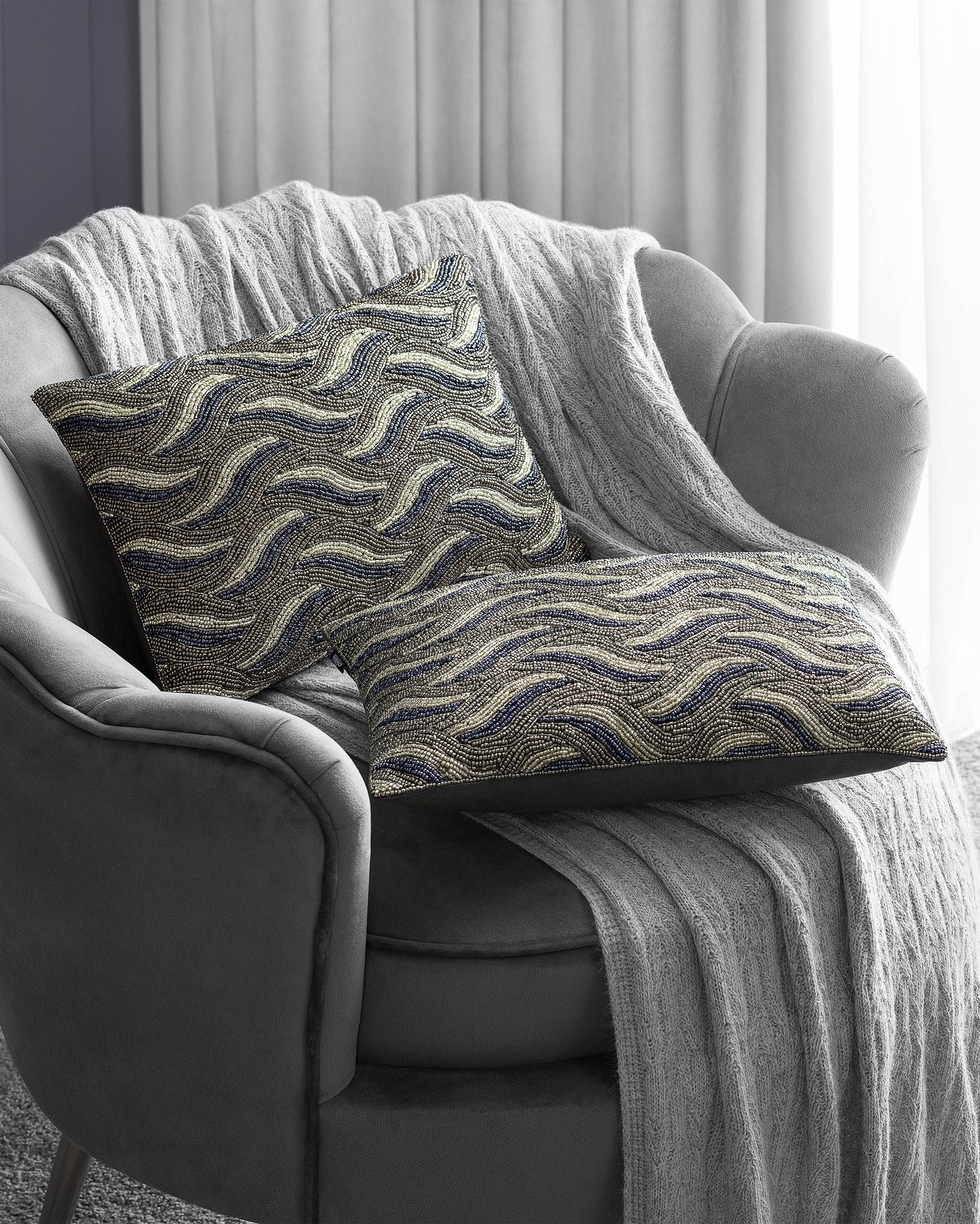 Togas Battu Decorative Pillow in Blue