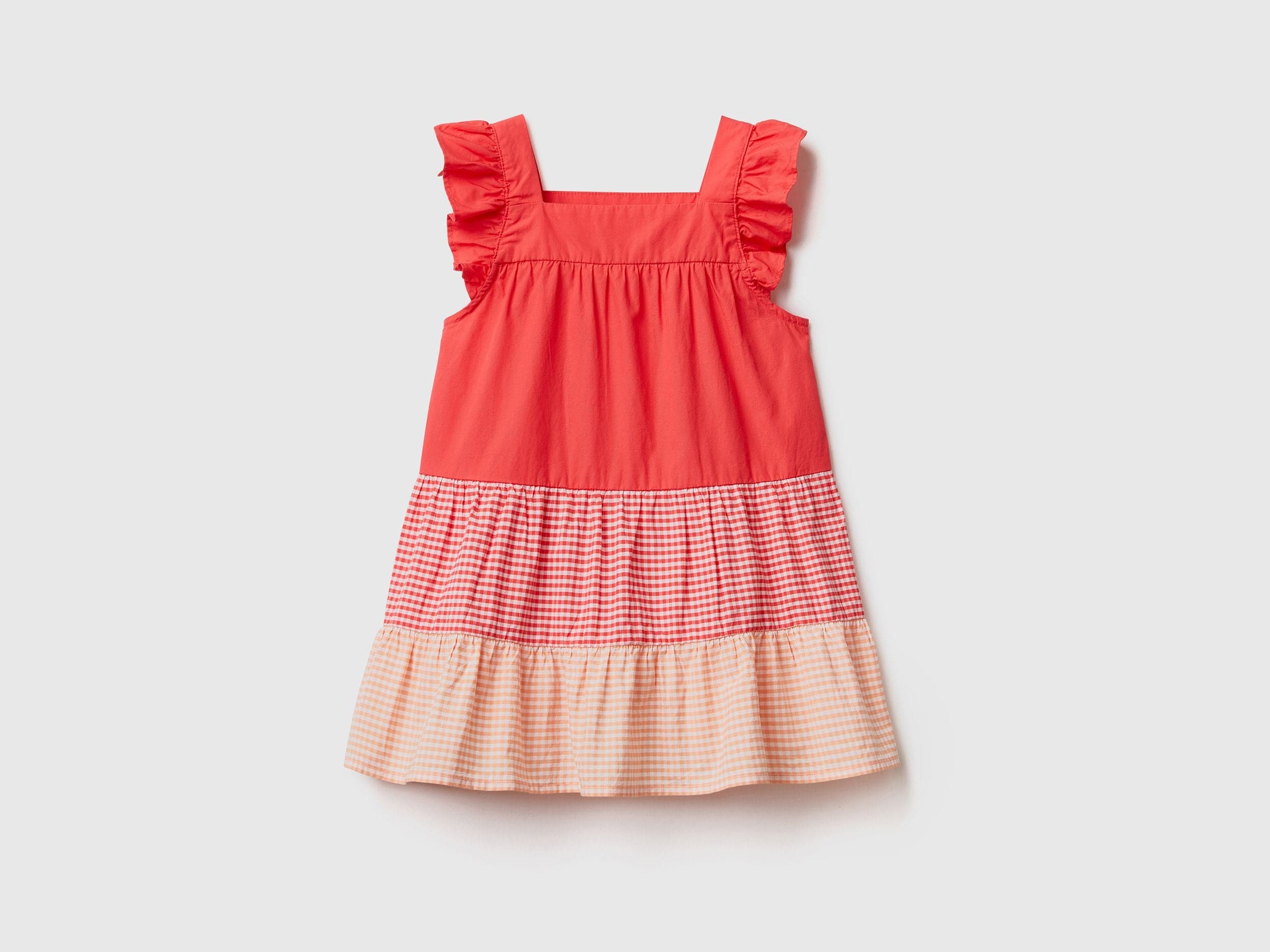 Dress with vichy flounces