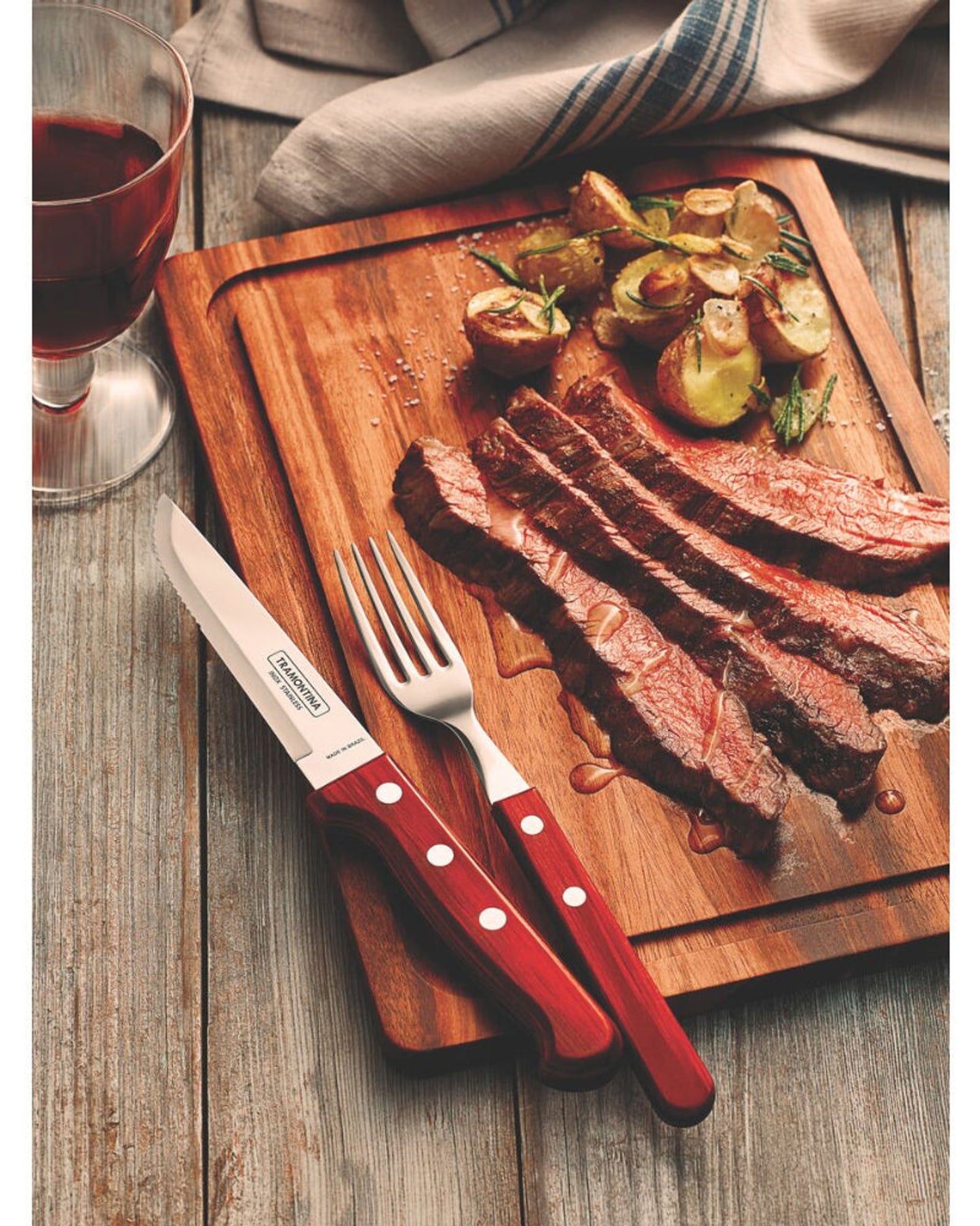 شوكة مائدة ترامونتينا تشوراسكو ذات أسنان من الفولاذ المقاوم للصدأ ومقبض من خشب البولي وود الأحمر المعالج