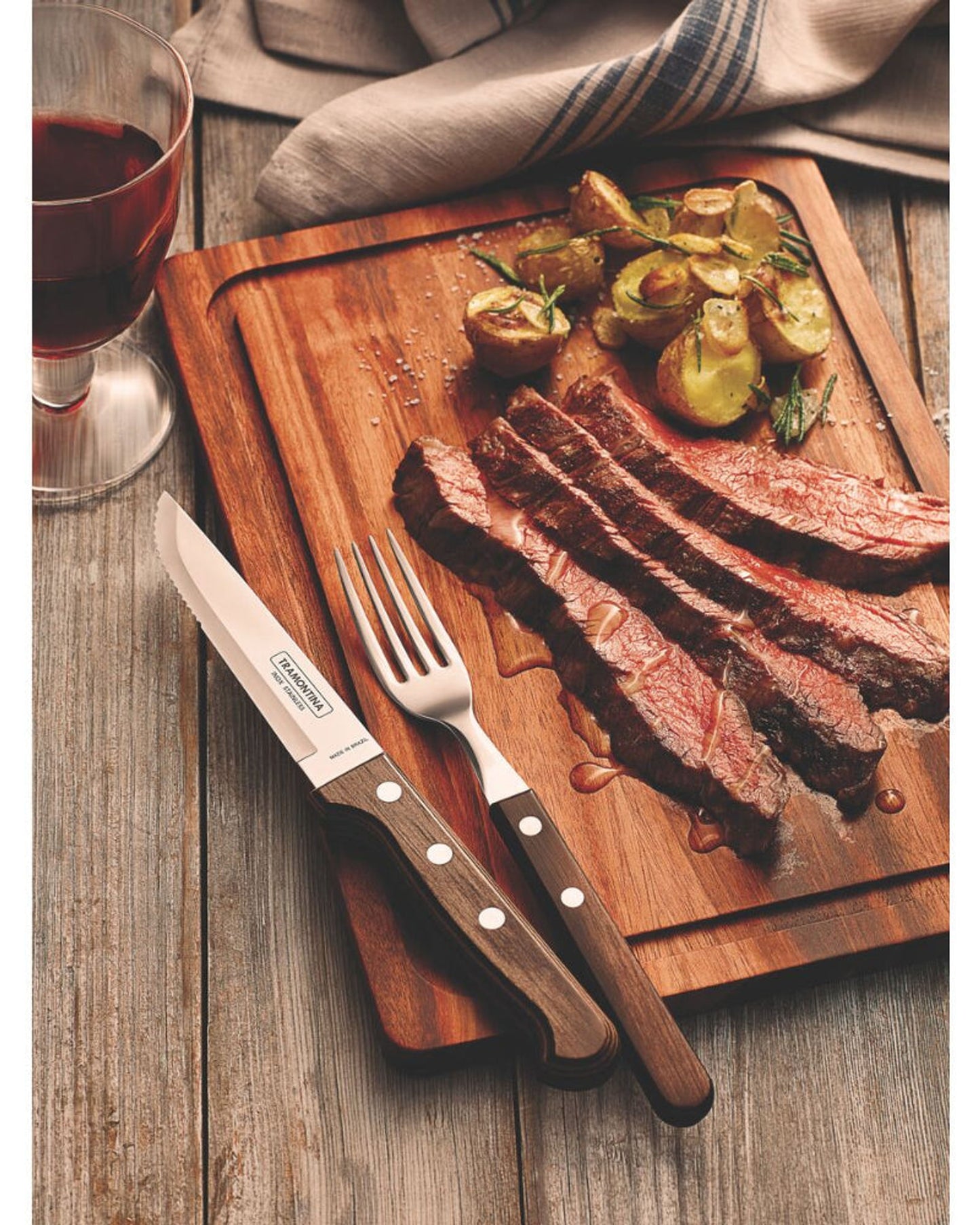 سكين شرائح اللحم ترامونتينا جامبو بشفرة من الفولاذ المقاوم للصدأ ومقبض من خشب البولي وود البني 5 بوصات