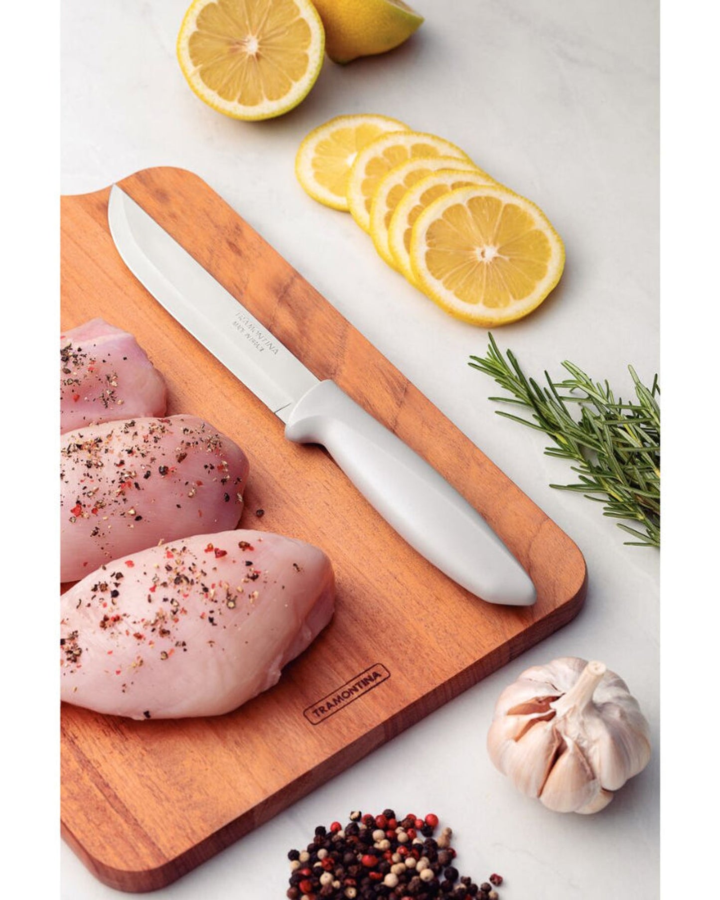 سكين مطبخ ترامونتينا بلينوس بشفرة من الفولاذ المقاوم للصدأ ومقبض من البولي بروبيلين بلون أبيض كريمي، 6 بوصات