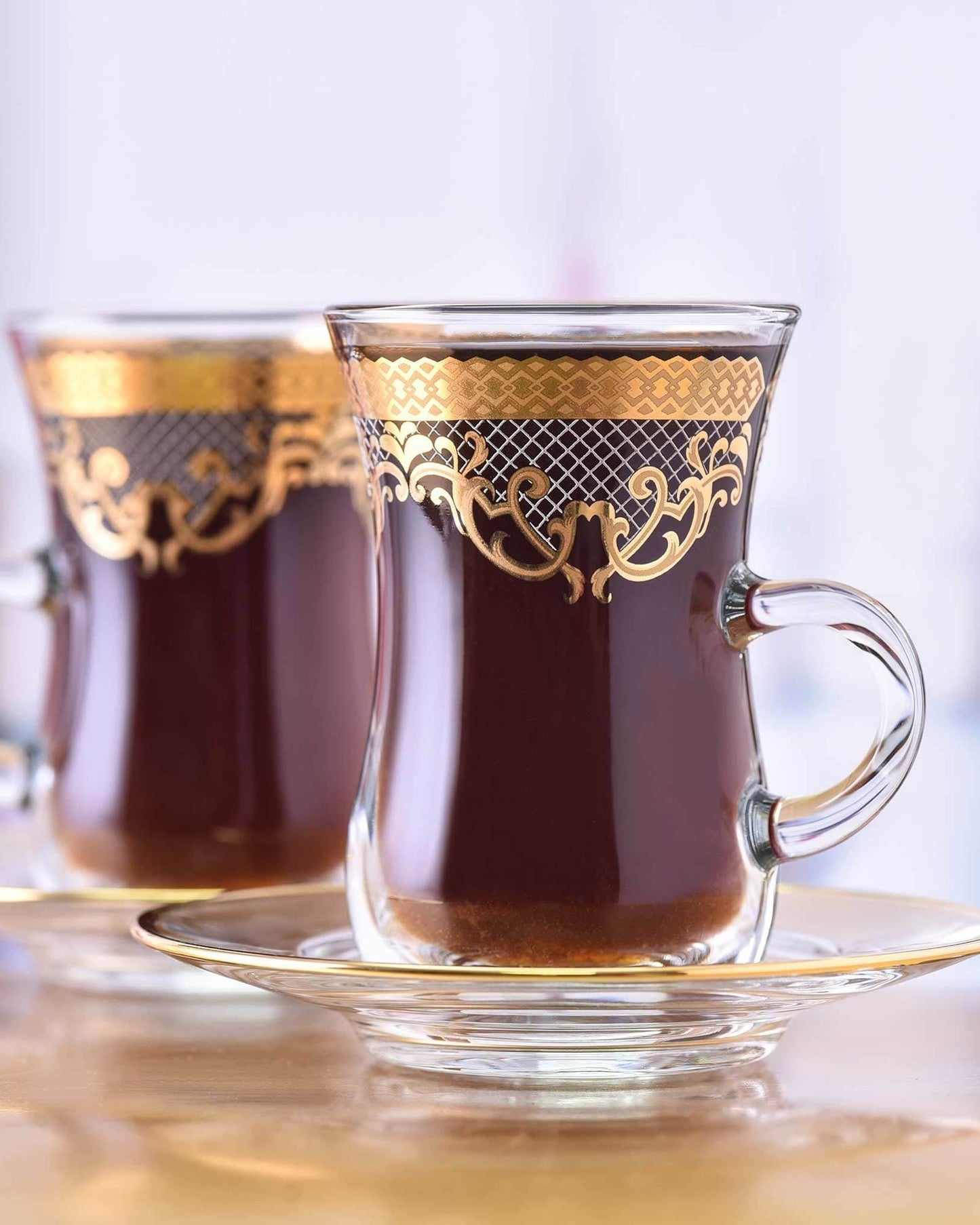 دملاج ترينا استكانة مع صحون 6 قطع ذهبي