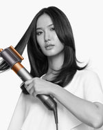 جهاز تصفيف الشعر متعدد الاستخدامات من دايسون إير راب، لون نيكل لامع ونحاس غني، للشعر الطويل الكامل