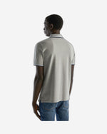 قميص بولو من القطن المطاطي بأكمام قصيرة