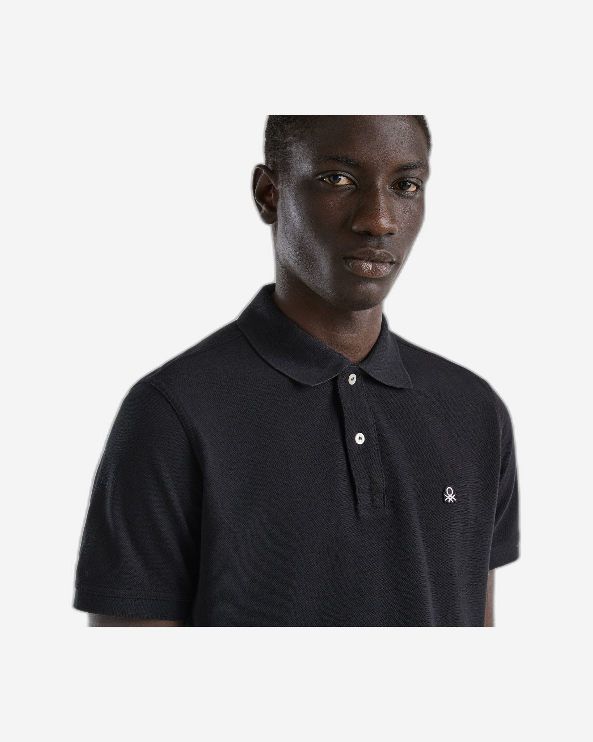 قميص بولو بأكمام قصيرة مصنوع من القطن بنسبة 100%