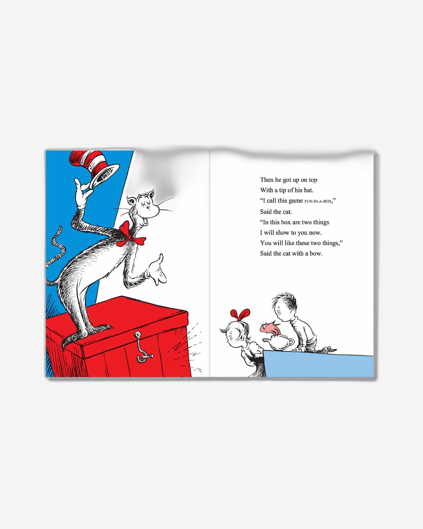 القطة في القبعة