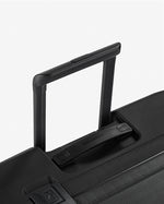 حقيبة ديلسي باريس ستون الصلبة ذات العجلات الأربع