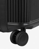 حقيبة ديلسي باريس ستون الصلبة ذات العجلات الأربع