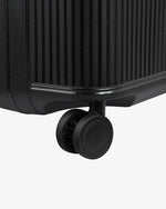 حقيبة ديلسي باريس ستون الصلبة ذات العجلات الأربع