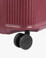 حقيبة ديلسي باريس ستون الصلبة ذات العجلات الأربع