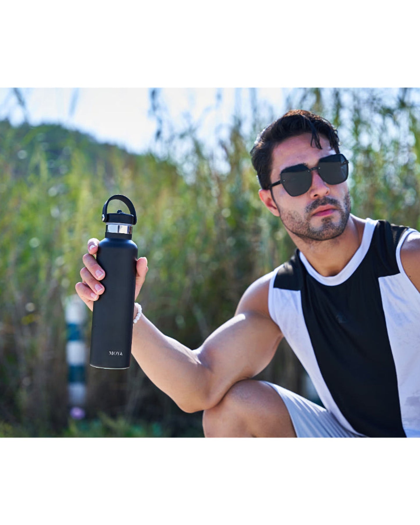 زجاجة مياه مويا "البحر الأسود" المعزولة والمستدامة، سعة 700 مل، باللون الأسود