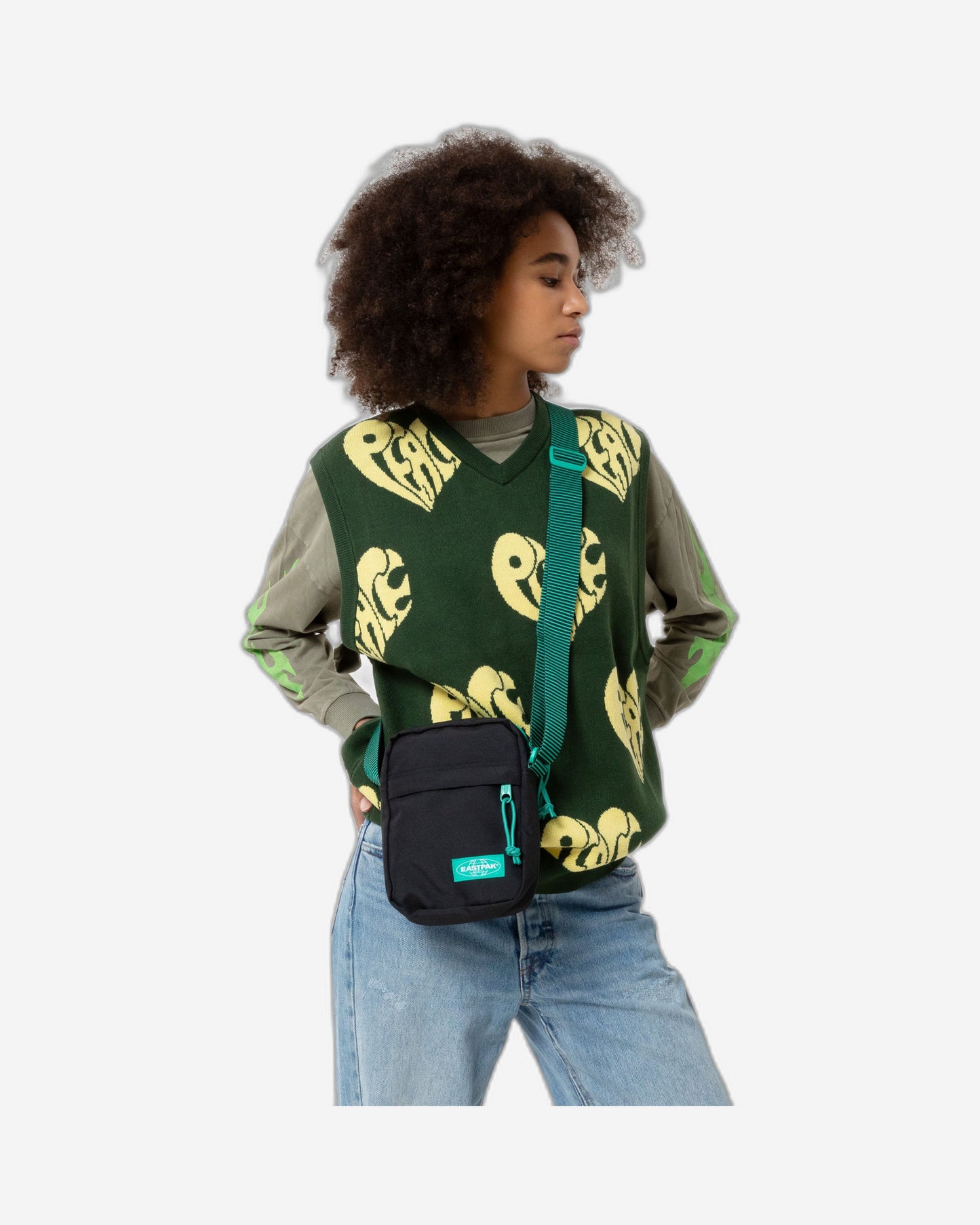 حقيبة كروس صغيرة سوداء مخططة من إيستباك ذا ون