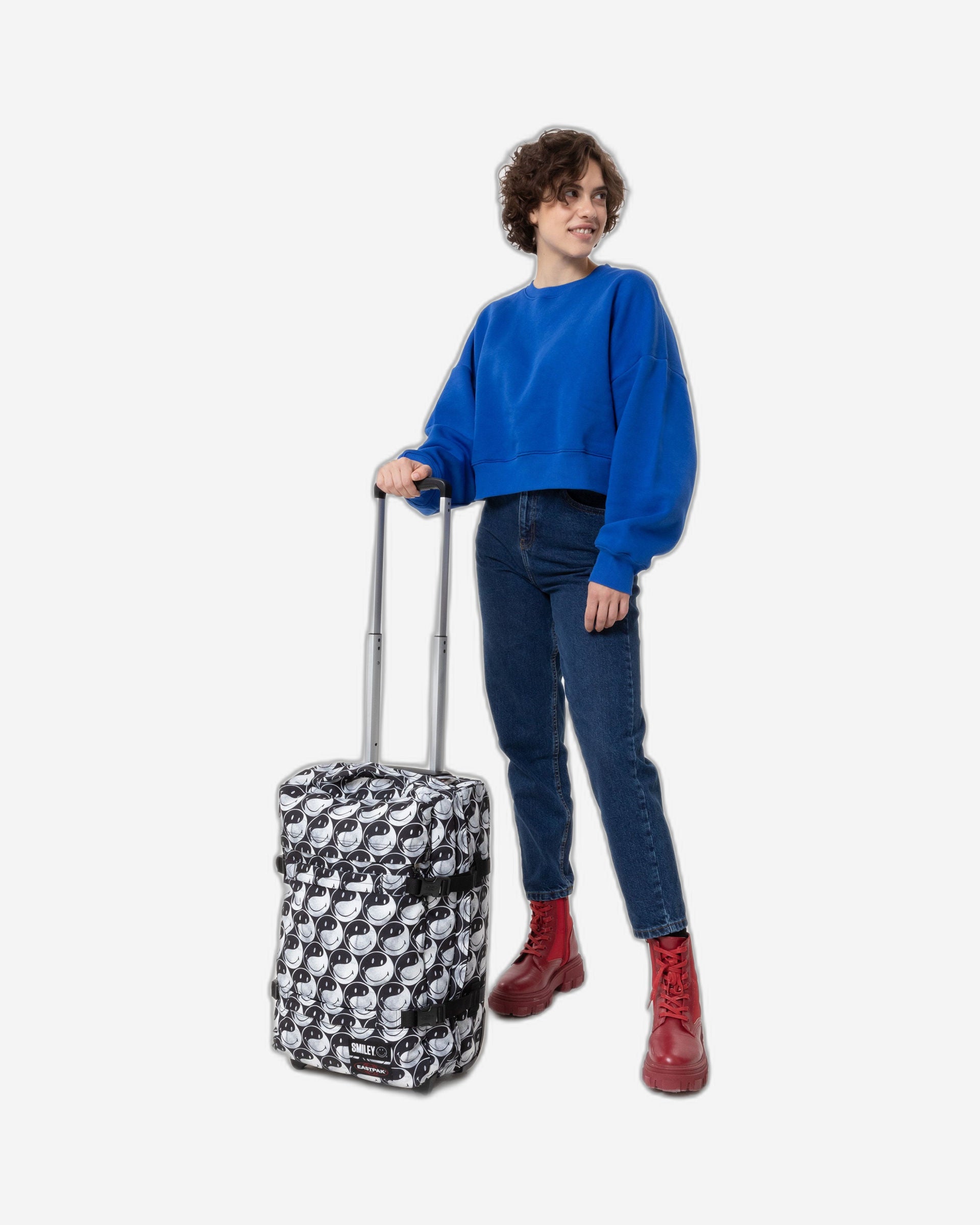 حقيبة سفر إيست باك ترانزيت إس سمايلي واي واي صغيرة ناعمة باللون الأسود - EK0A5BA75K21