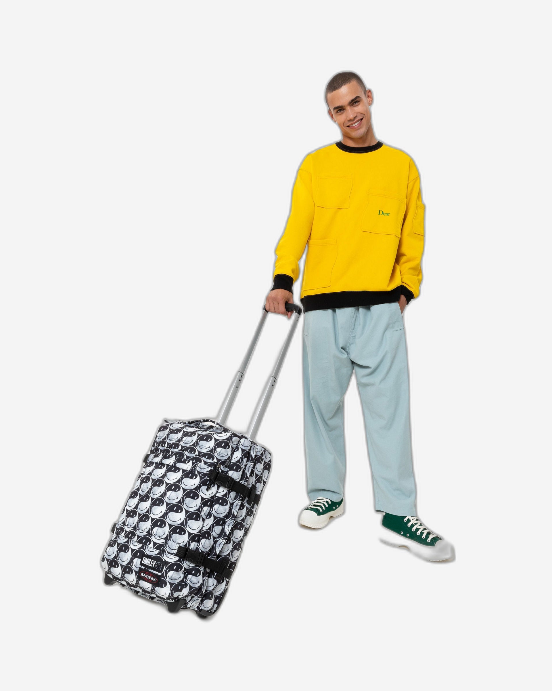 حقيبة سفر إيست باك ترانزيت إس سمايلي واي واي صغيرة ناعمة باللون الأسود - EK0A5BA75K21