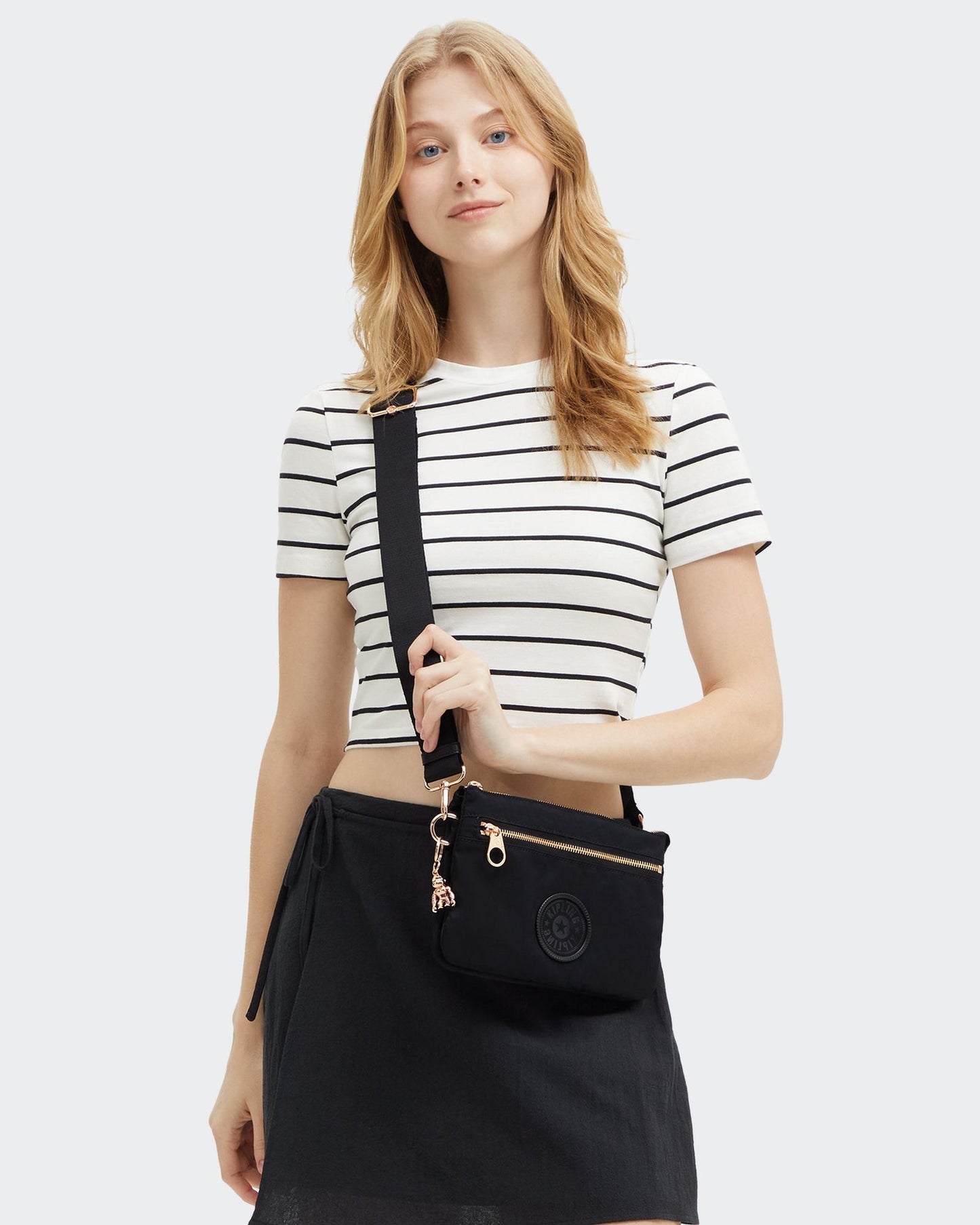 حقيبة كيبلينج ريرى زيب صغيرة سوداء وردية اللون I3302-62Q