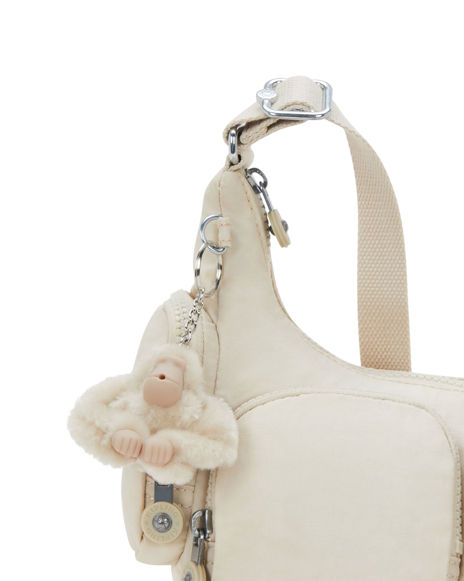 حقيبة كيبلينج ريكا إس هايدواي صغيرة باللون البيج I4333-7JR