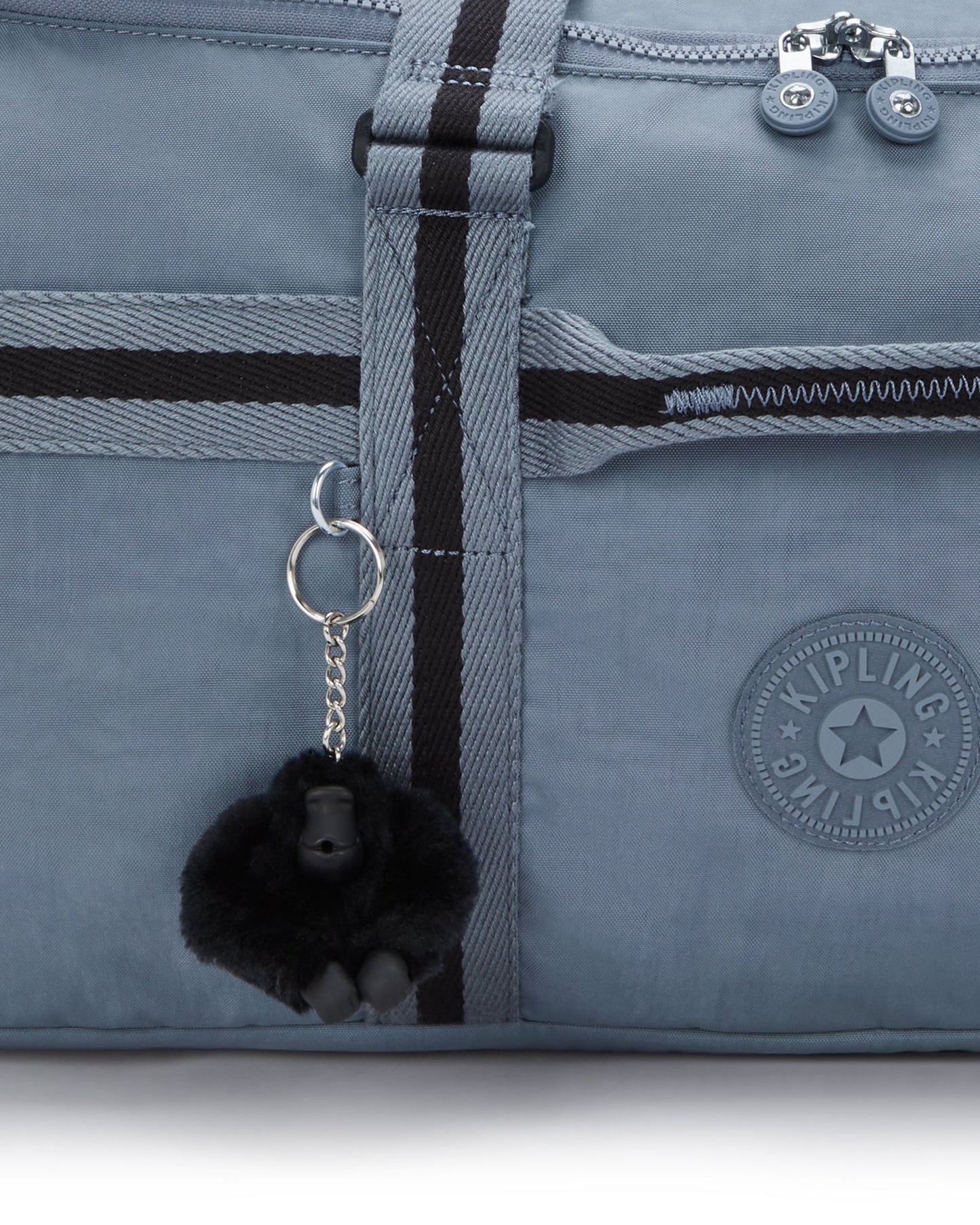 حقيبة Kipling Jonis M Blue Stone متوسطة الحجم للعطلات الأسبوعية (قابلة للتحويل إلى حقيبة ظهر) I7893-6FB