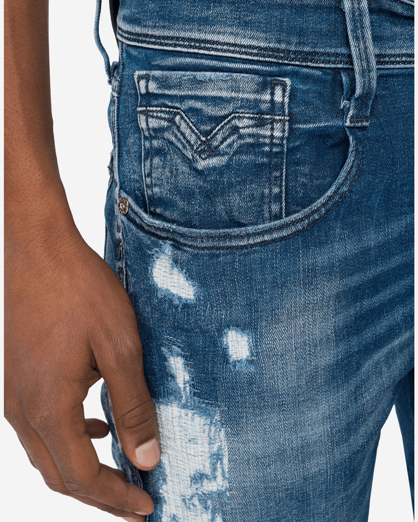 بنطال جينز بروني بقصّة Slim Fit