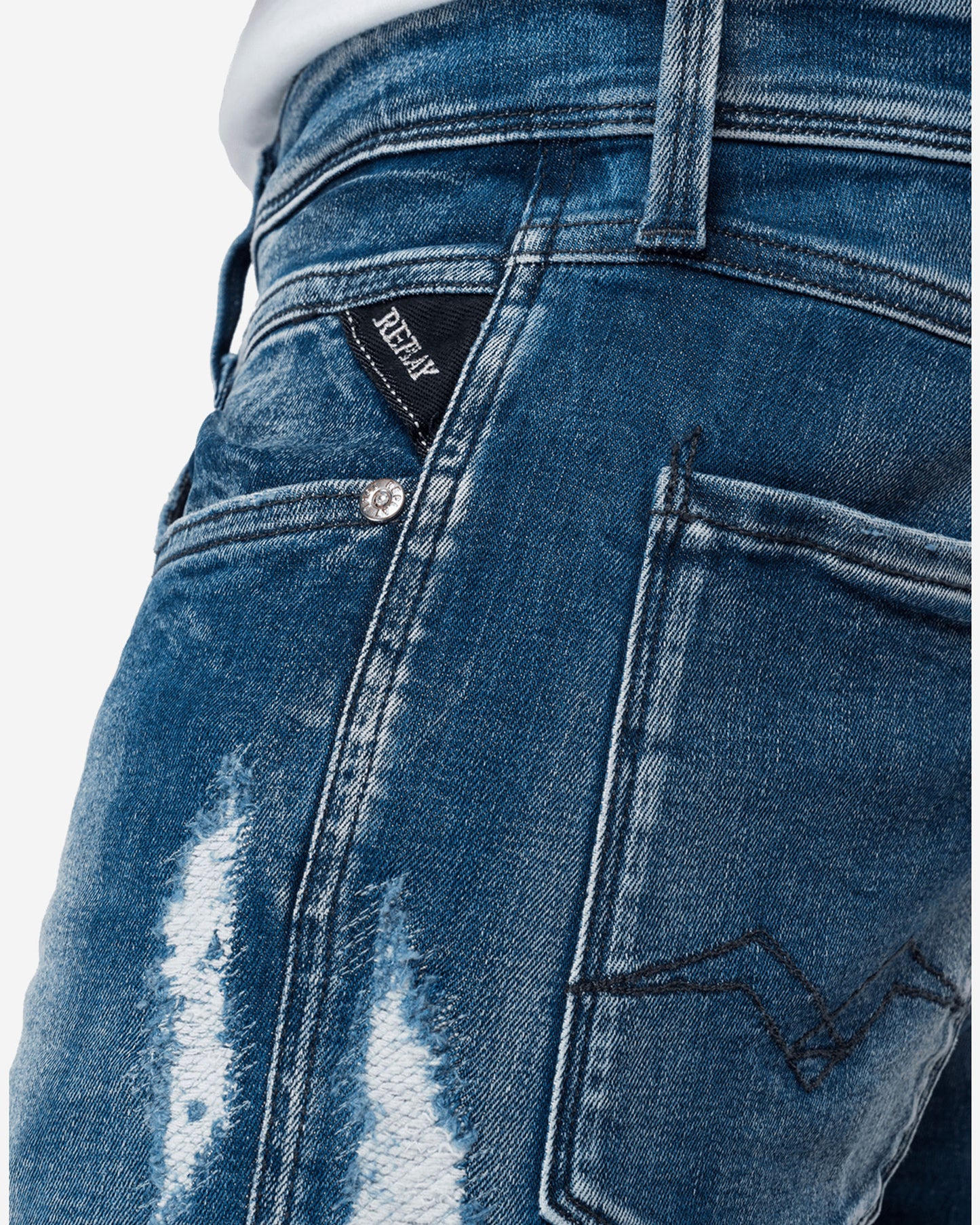 بنطال جينز بروني بقصّة Slim Fit