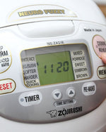 جهاز طهي الأرز الإلكتروني من زوجيروشي، سعة 1.8 لتر، لون أبيض فاخر