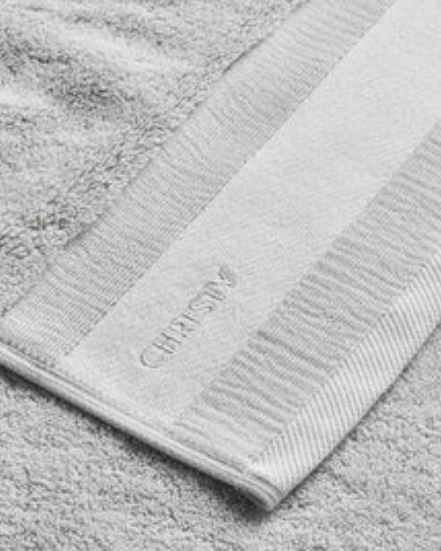 مجموعة مناشف الحمام "سيجنيتشر" من كريستي باللون البلاتيني 