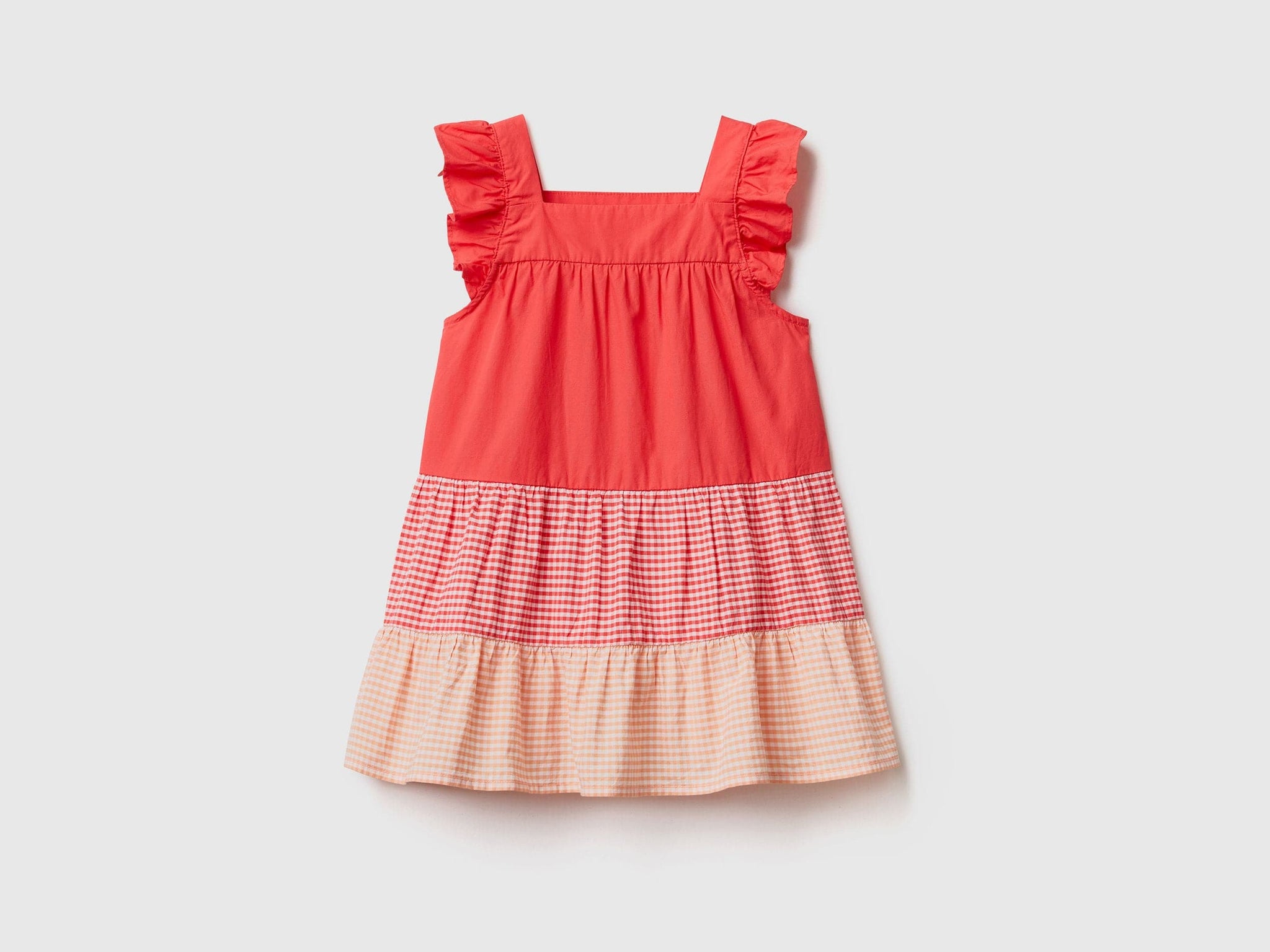 Dress with vichy flounces