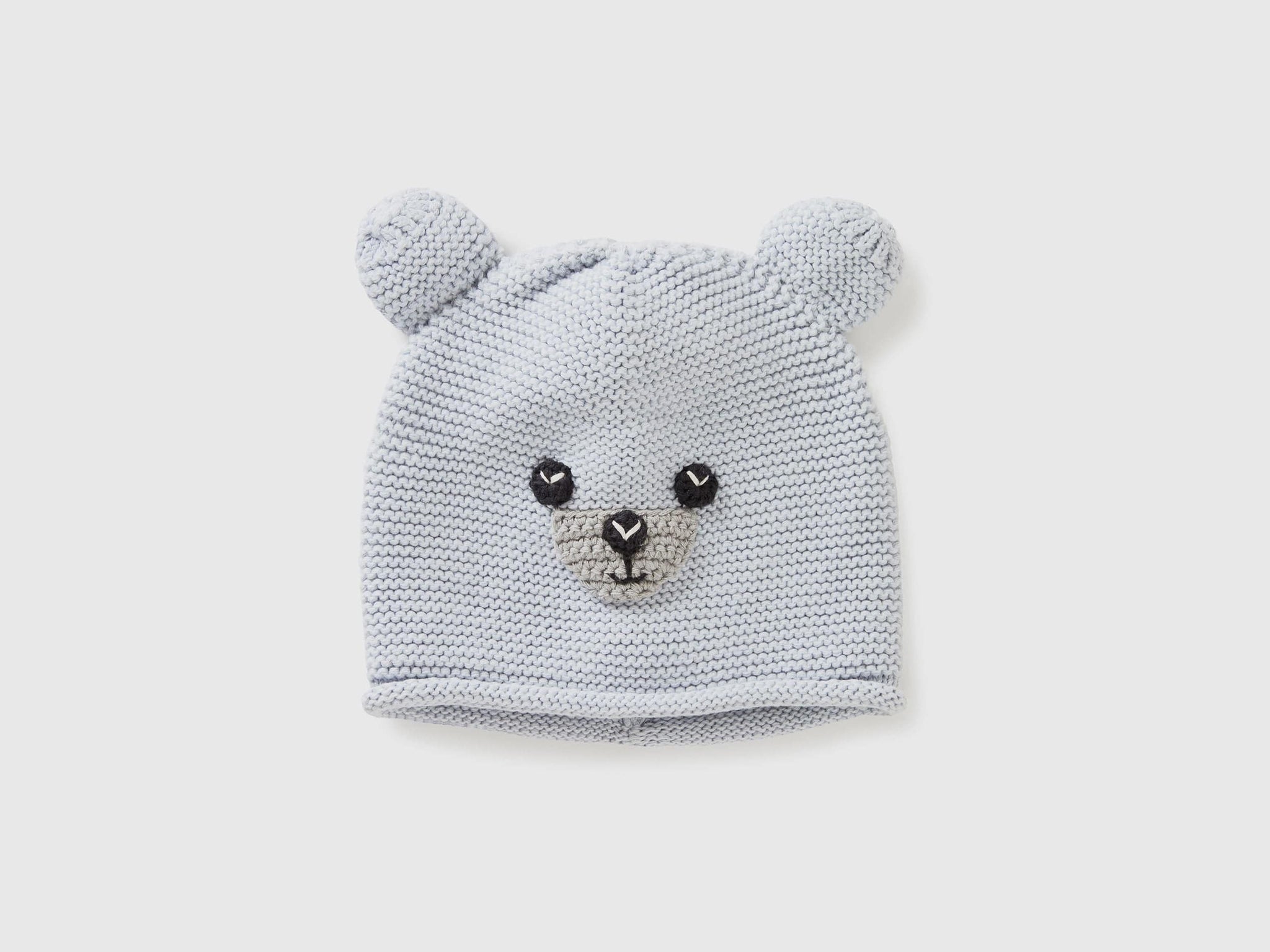 Tricot hat with applique