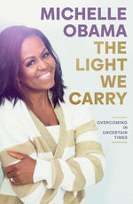 THE LIGHT WE CARRY : OVERCOMING IN UNCERTAIN TIMES